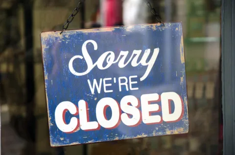 Sign - "Sorry, we're closed"